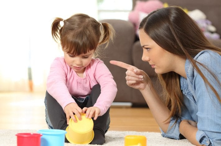 potty training - mother telling daughter off