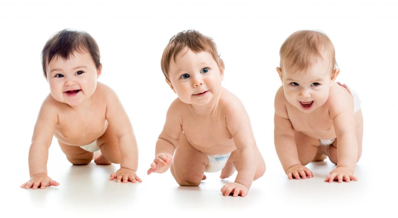 Babies (3) crawling and smiling