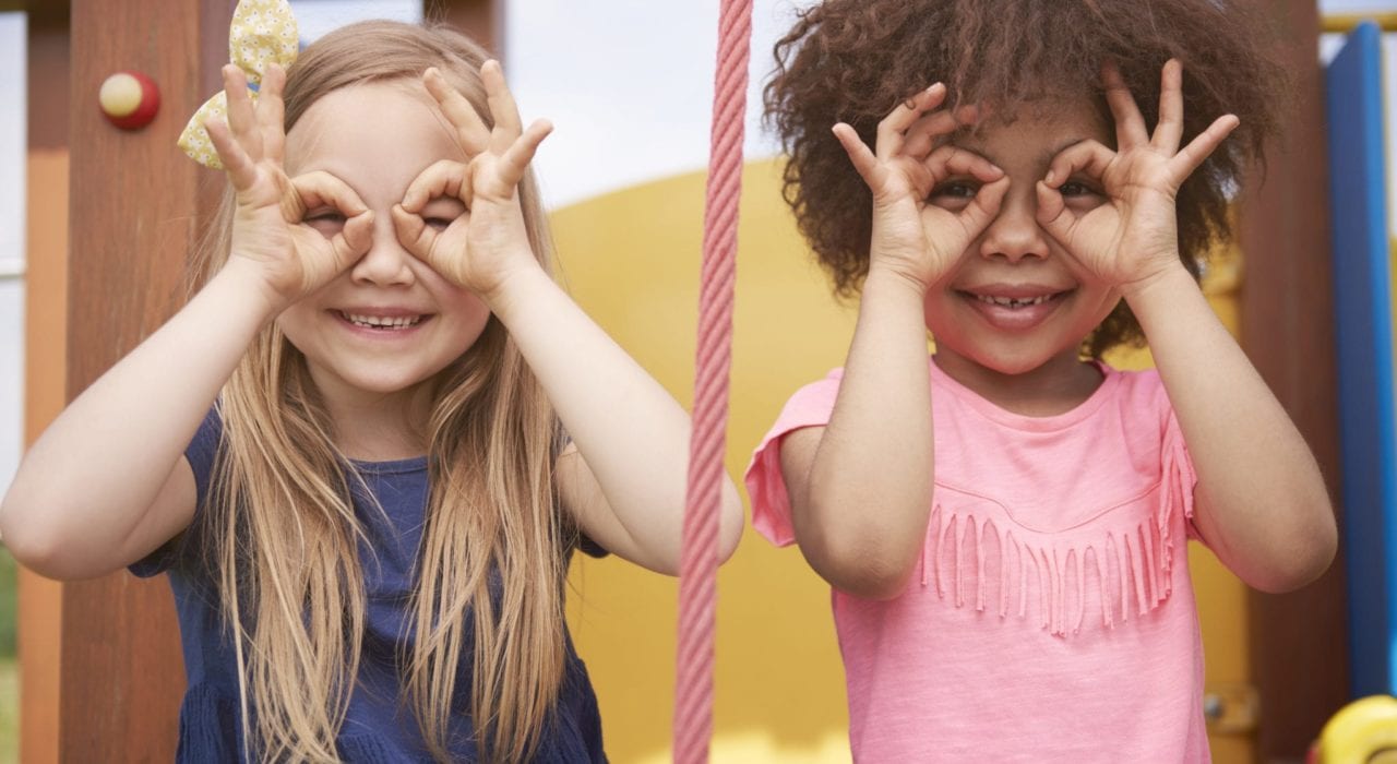 kids to succeed - kids play - girls playing imagination game importance of play