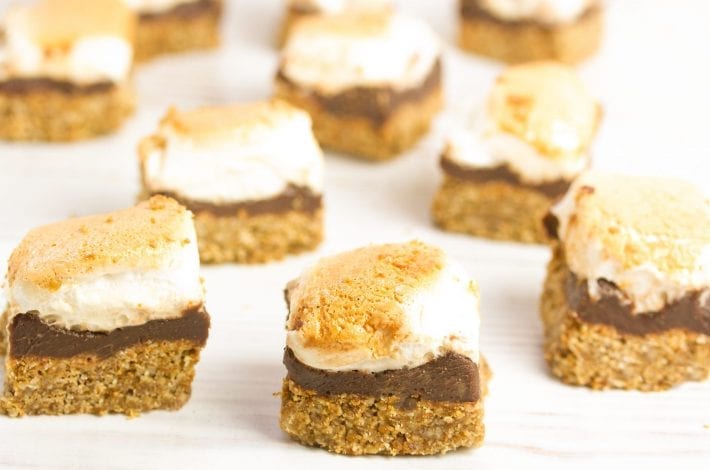 Baked smores bars with an oat base - make these gooey dessert bars for a bonfire night treat