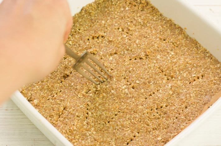 Baked smores bars with an oat base - make these gooey dessert bars for a bonfire night treat