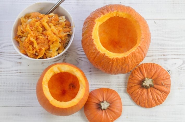 Make this classic squash and pumpkin soup this Halloween - creamy pumpkin soup with rosemary and served in pumpkin shells
