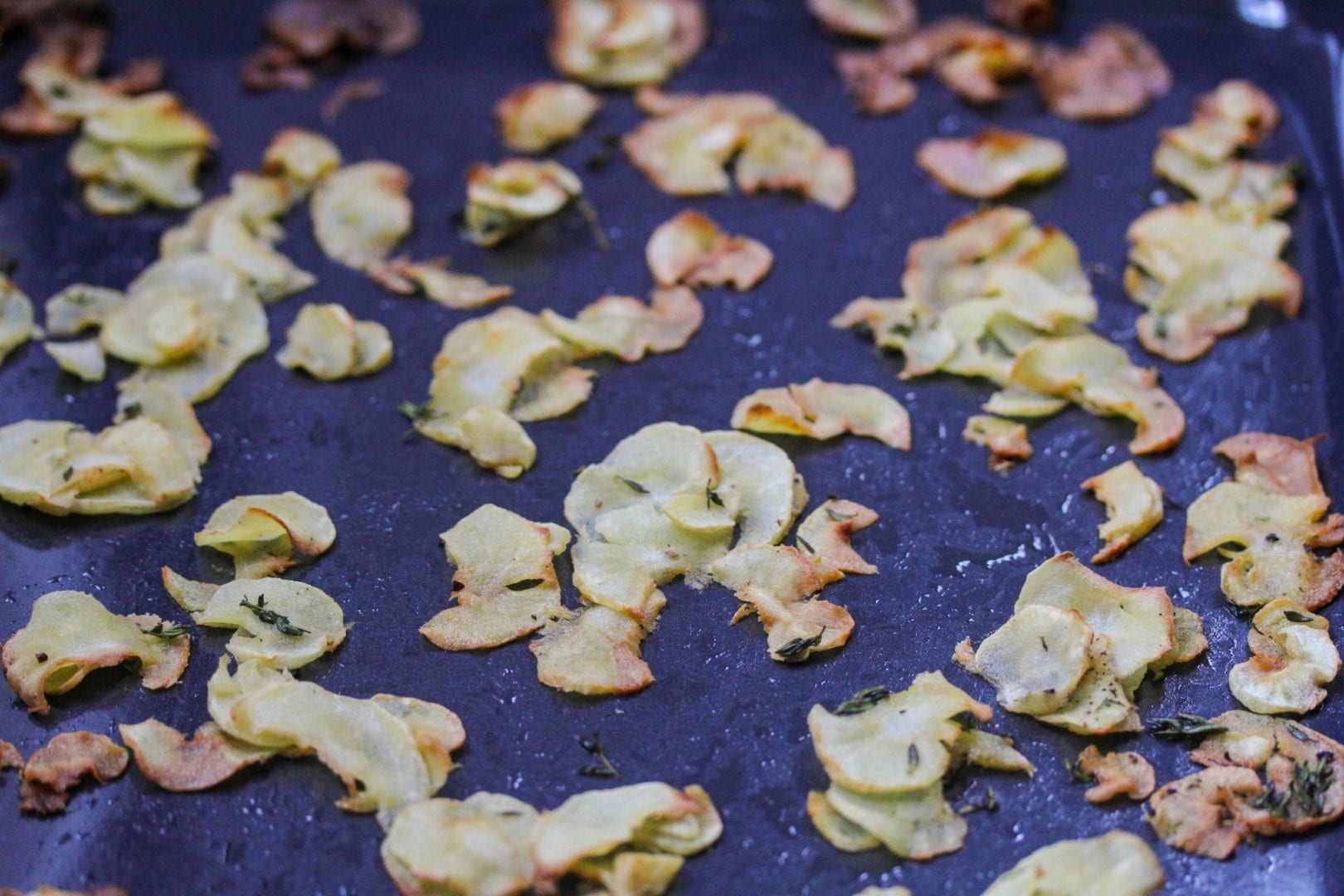 Parsnip chips, parsnip crisps with thyme. Healthy kids snack or side