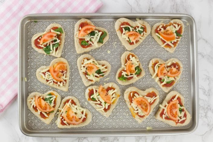 Pizza hearts - try this fun Valentines recipe for kids with these mini pizzas