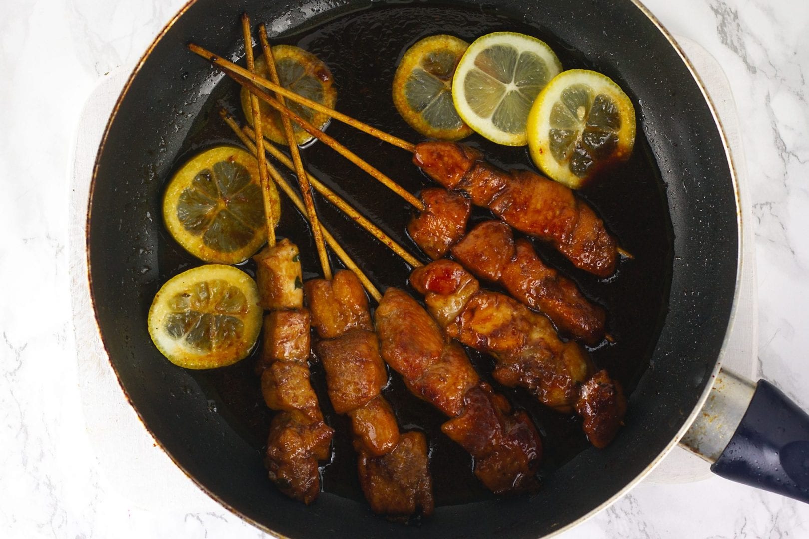 Sticky chicken skewers with honey and lemon