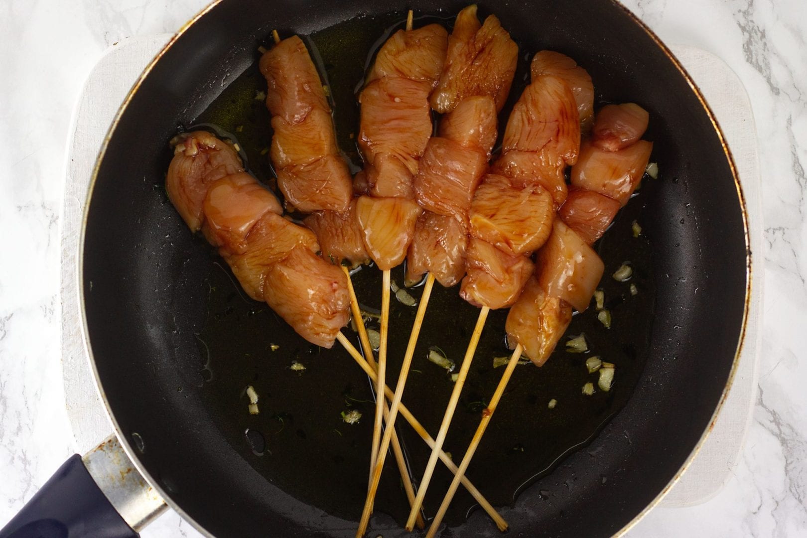 Sticky chicken skewers with honey and lemon