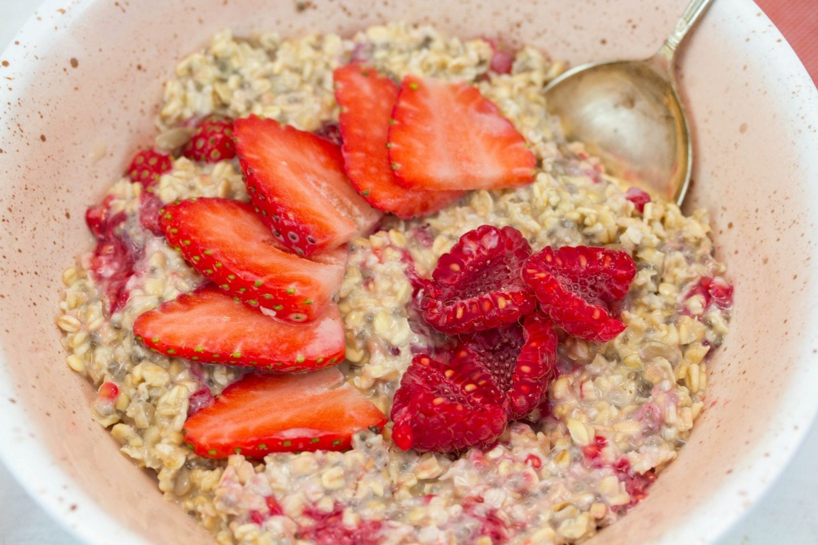 Healthy bircher muesli - try this deliciously healthy bircher muesli made with raspberry strawberries and chia seeds for a healthy breakfast for kids