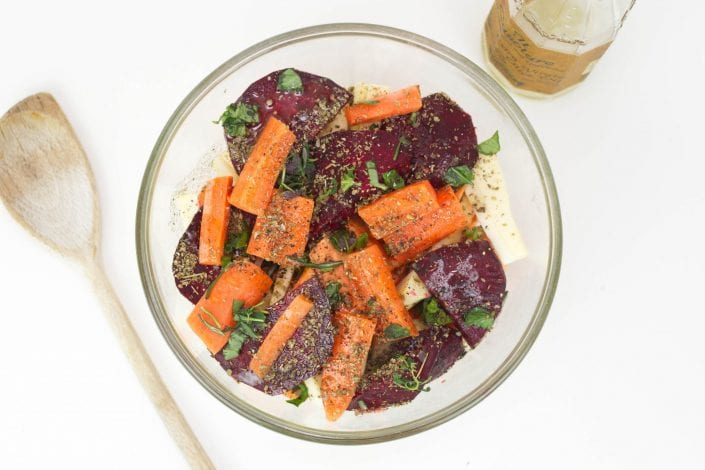 Roast beetroot and root vegetables with fresh herbs - perfect for Sunday family lunch