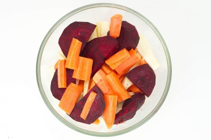 Roast beetroot and root vegetables with fresh herbs - perfect for Sunday family lunch