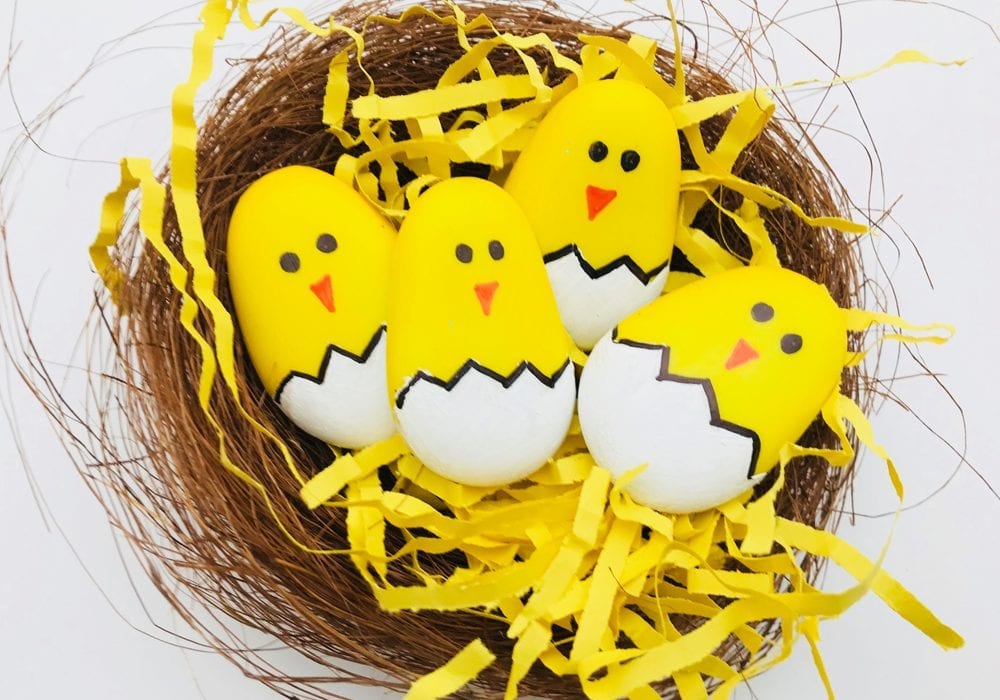 Easter rock painting - make these great easter chicks by painting pebbles - a great easter craft for kids