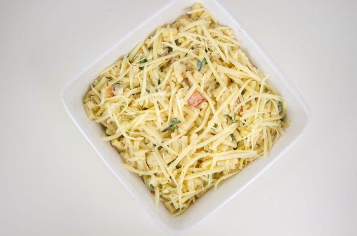Bacon and apple mac and cheese at its best with slices of apple and a creamy sauce and hidden veggies