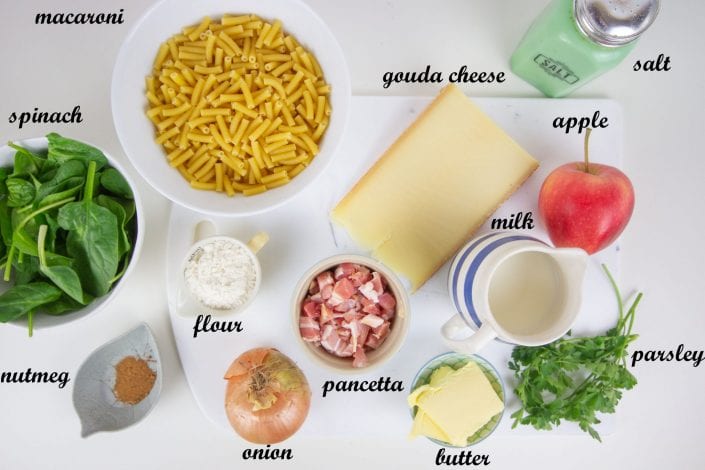 Bacon and apple mac and cheese at its best with slices of apple and a creamy sauce and hidden veggies
