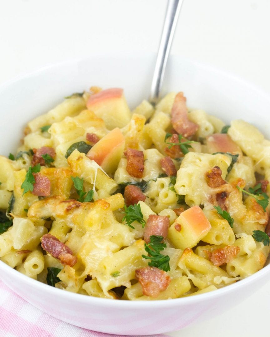 Bacon and apple mac and cheese at its best with slices of apple and a creamy sauce and hidden veggies