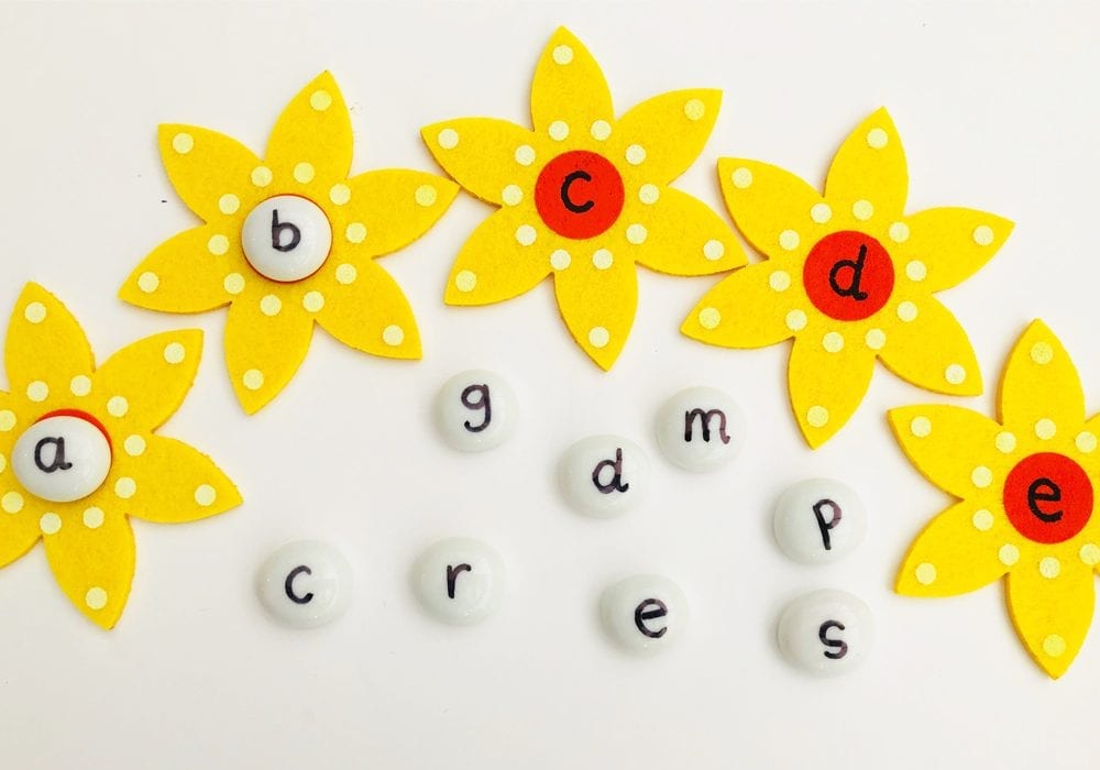 Alphabet pebbles - a fun early years learning game to help kids learn their first phonics and first letters
