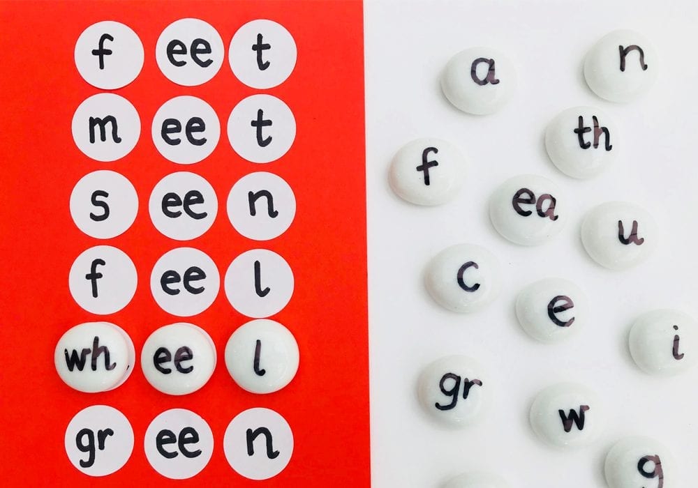 Alphabet stones - learn how to spell first words with this alphabet pebble spelling game. Ideal for early years learning and using letter phonics to sound out first words.