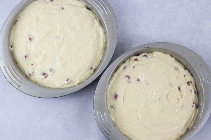Summer raspberry cake - lemon and raspberry cake layers with a creamy topping #summerraspberrycake #raspberrycake #dessert #summerdessert #cake #summercakes