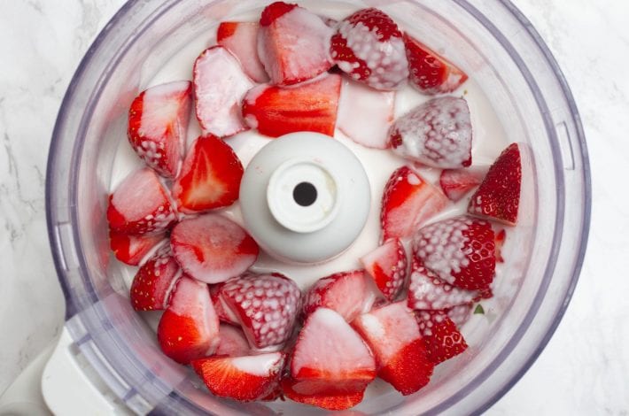 Frozen fruit chew bites made with fresh strawberries and peanut butter and frozen into bars for kids snacks