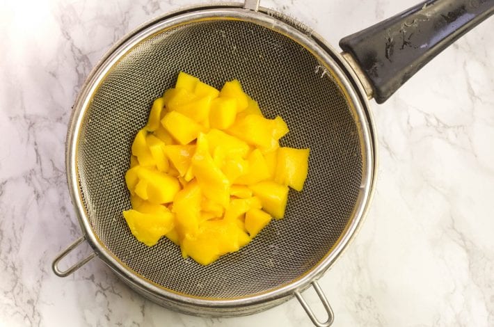 Mango and banana puree - great first foods for baby blended into a puree