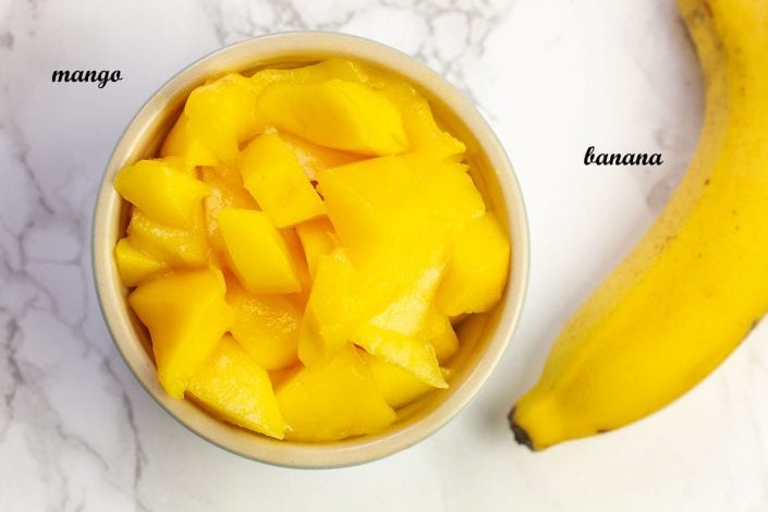 Mango and banana puree - great first foods for baby blended into a puree