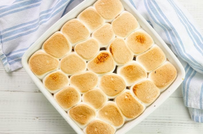 Baked smores bars with an oat base - make these gooey dessert bars for a bonfire night treat