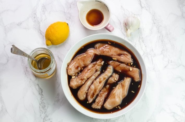 Honey balsamic sheet pan chicken - a great family dinner recipe with mini chicken fillets in balsamic glaze