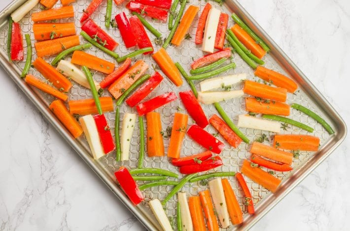 Honey balsamic sheet pan chicken - a great family dinner recipe with mini chicken fillets in balsamic glaze
